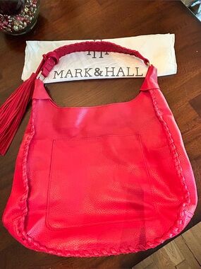 Mark & Hall shoulder Red pebbled Hobo Bag with Braided Trim and red tassel.